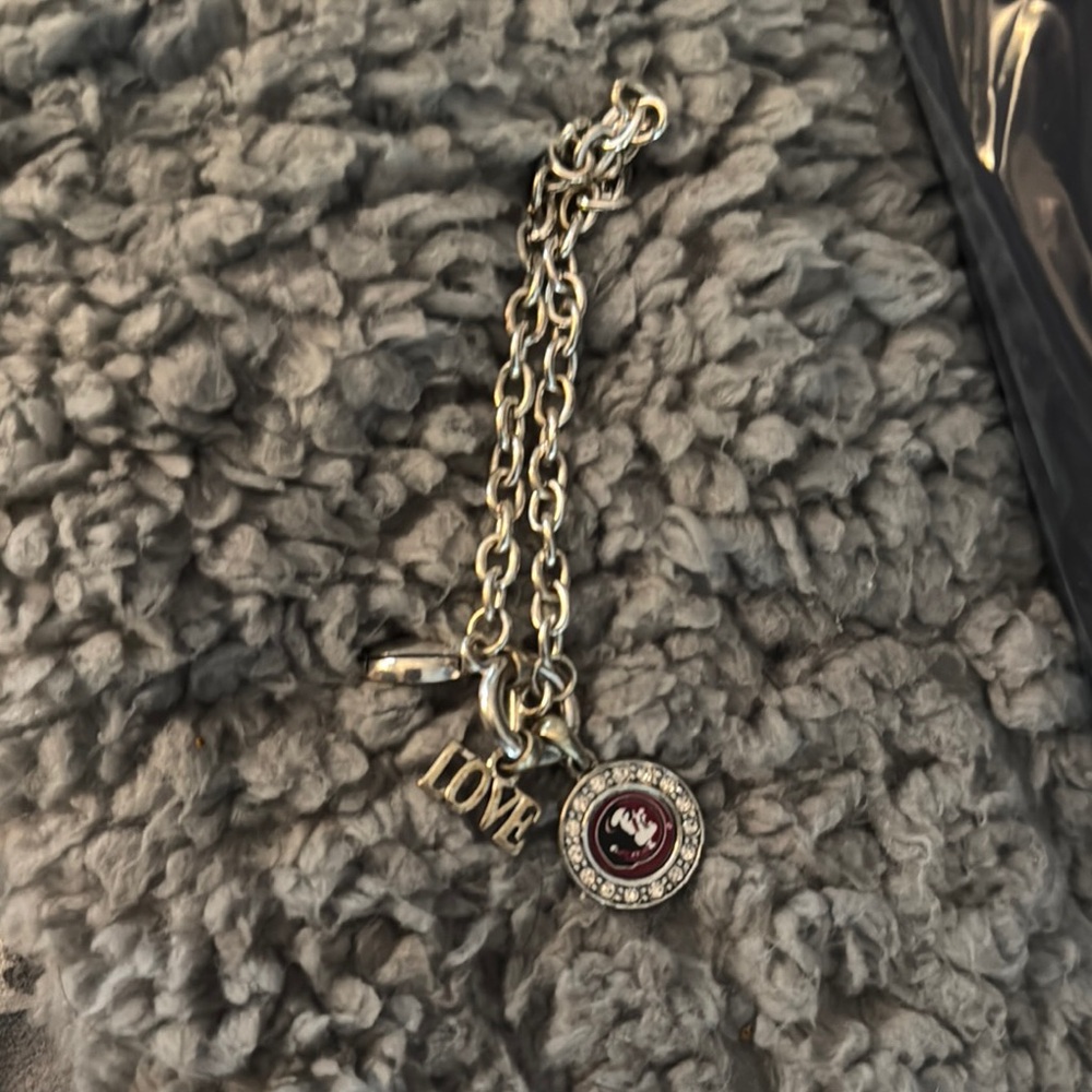 Silver tone FSU Charm Bracelet with Love, football and Seminole head charms